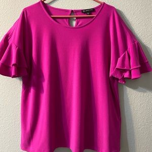 INC ruffle sleeve blouse.  Great for work or play!
